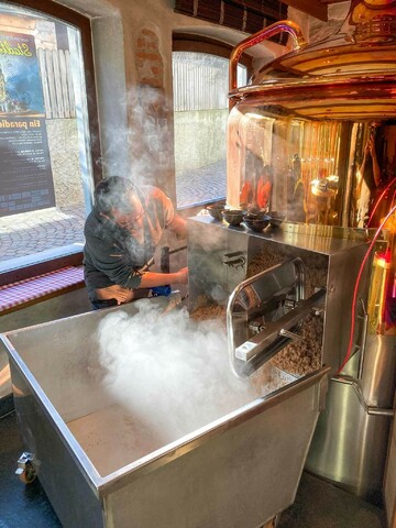 In action: The master brewer at his machine in the brewhouse